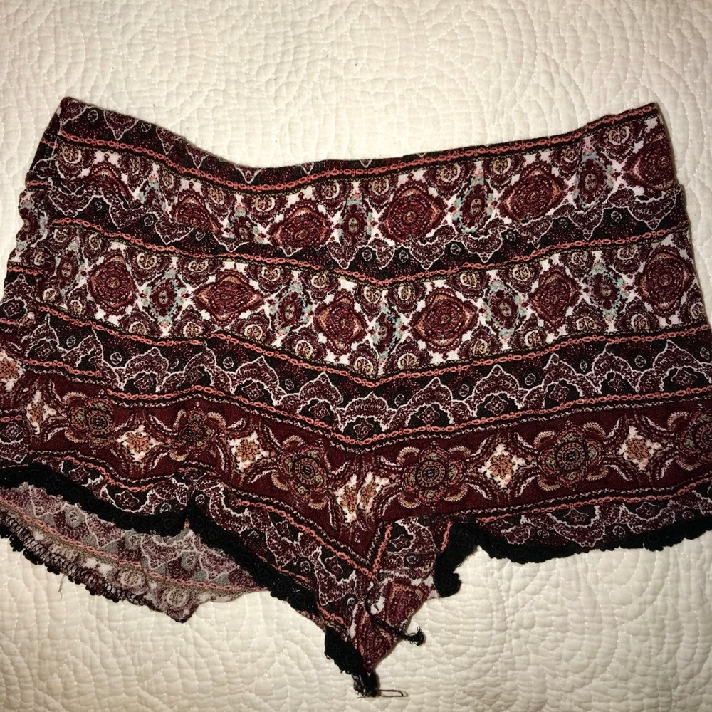 Martin and black flowy shorts